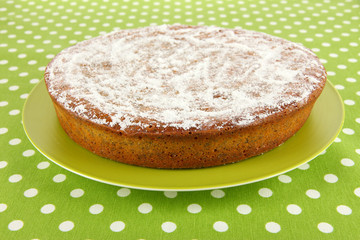 Delicious poppy seed cake on table close-up
