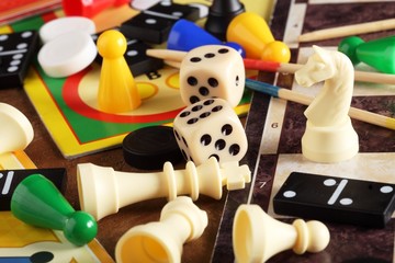 Board games, pawns, chessmen, dominoes and dices