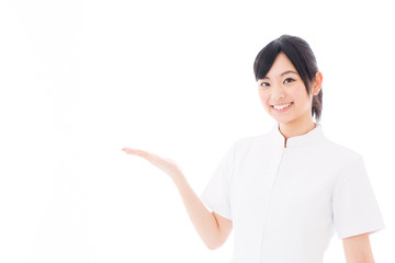 attractive asian nurse showing on white background