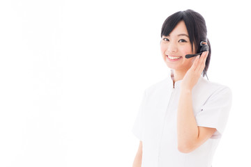 attractive asian nurse with headset 