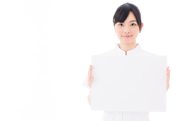 attractive asian nurse on white background