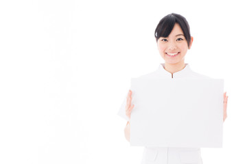 attractive asian nurse on white background