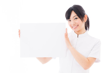 attractive asian nurse on white background