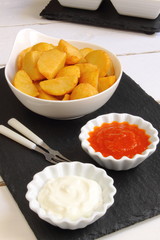Potato wedges with two sauces
