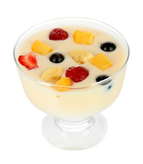 Delicious yogurt with fruit isolated on white