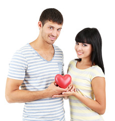 Beautiful loving couple with heart isolated on white