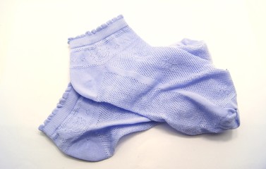 blue socks on white background