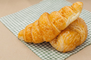 Breakfast with fresh baked croissants and coffee.
