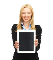 smiling woman with tablet pc in office