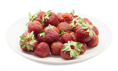 Red strawberrys on the plate. Isolated