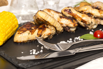 chicken wings are grilled