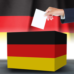 Hand with ballotand box on Flag of Germany