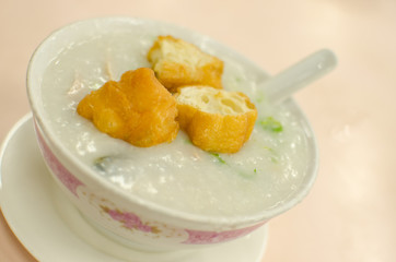 Pork Congee soup with deep fried breads to eat