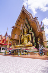a big golden buddha at wat thum sua, karnchanaburi, thailand