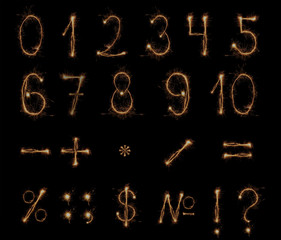 Fireworks numbers and symbol on black background