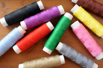 Many spools of thread