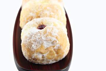 Donuts on a plate.