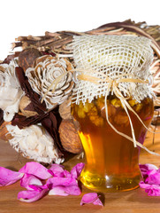 Colorfull Honeypot with walnuts.