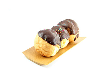Chocolate donuts in the Bamboo dish.
