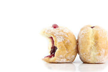 Blueberry donuts and bite.