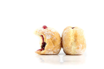 Blueberry donuts and bite.