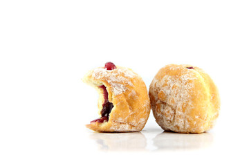 Blueberry donuts and bite.