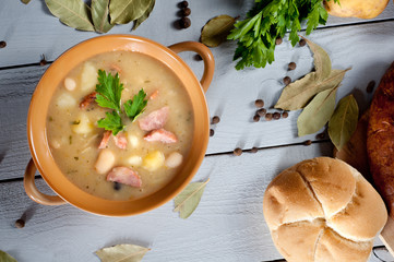 Thick bean soup with traditional sausage - 53821438