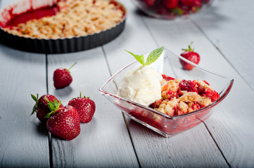 Strawberry crumble with ice cream and muesli
