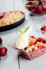 Strawberry crumble with ice cream and muesli