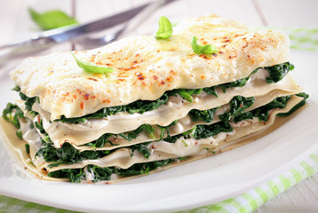 Close-up of a spinach lasagna on a plate