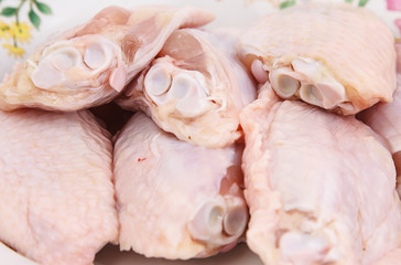 Closeup of raw chicken wing