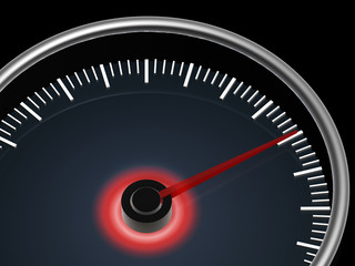 speedometer on dark background