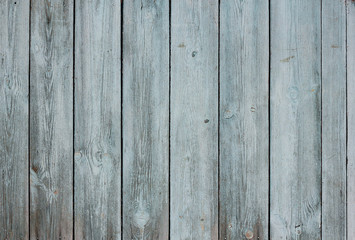 Grunge wood background with blue peeling paint
