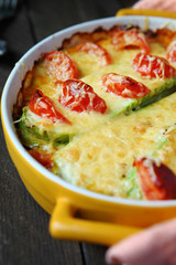 zucchini baked with cheese and tomato