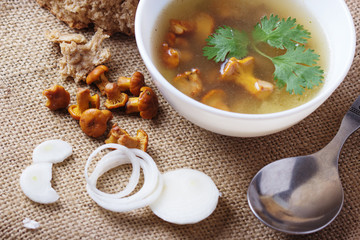 Cup of soup with chanterelles