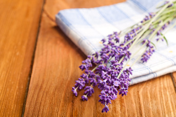 Fototapeta na wymiar lavender flower on the wooden background