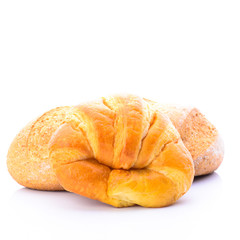 Fresh and tasty croissant over white background
