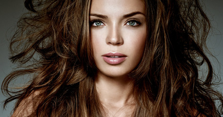 Naklejka premium beautiful brunette with gorgeous hair