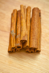 Hill vanilla beans on wooden background