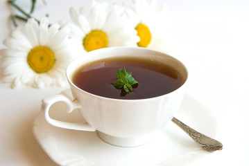 Black tea in a white cup