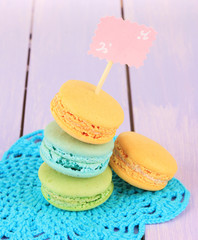 Macaroons on wooden table close-up