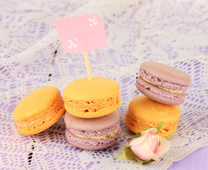 Macaroons on wooden table close-up