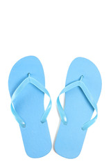 blue male flip flops over white