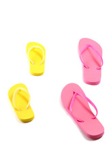 red and yellow flip flops isolated on white background
