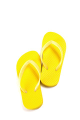 yellow summer flip flops isolated on white