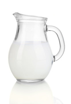 Milk in jug isolated on white