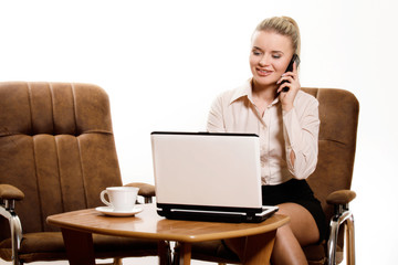 Young businesswoman talking on cellphone