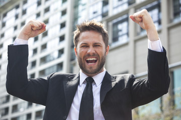 Young Successful Business Man Celebrating in City