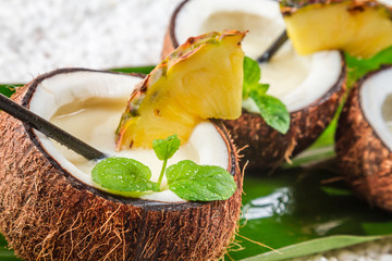 Closeup of pinacolada in a coconut