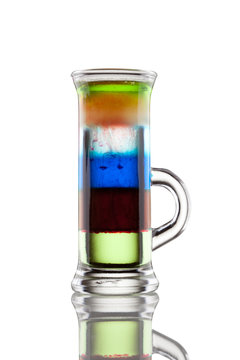 Multi-layered alcohol shot isolatet on white